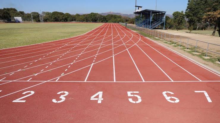 Numbered starting lanes on an athletics track