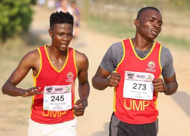 Two University of Mpumalanga runners racing cross country